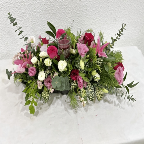 Mix Flowers of Roses, Lilies & Eustoma with Low Candles